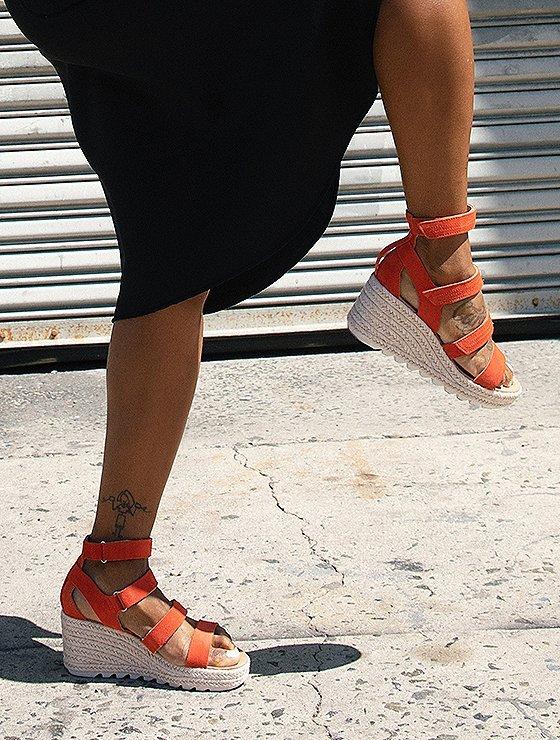 Sonjia Williams wearing Cameron Multi Strap Wedges