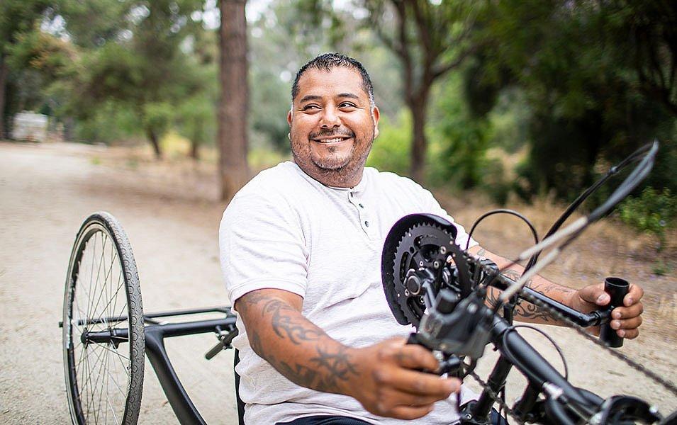 A man riding a bike.