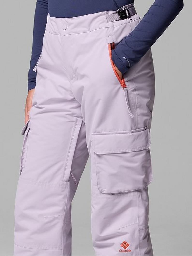 Woman in snow pants.