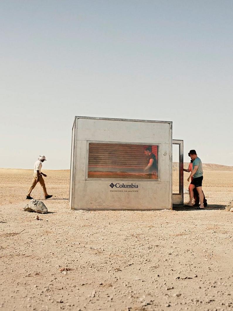 Thumbnail of two men walking into a sauna in the desert
