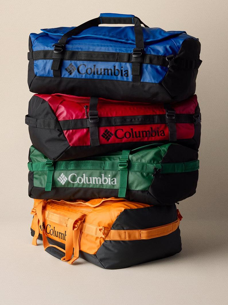 Stack of four duffel bags in blue, red, green, and orange with black trim and adjustable straps.
