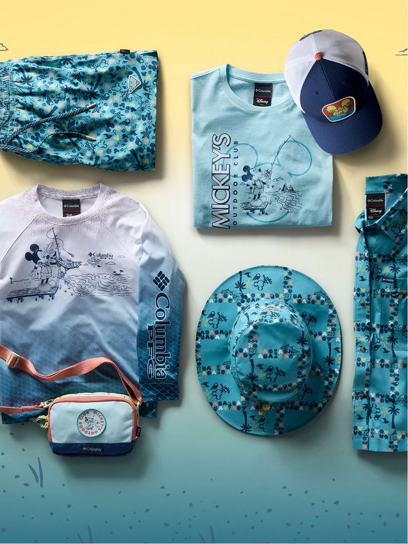 Flatlay of Disney gear with Mickey Mouse prints on a yellow and blue background.