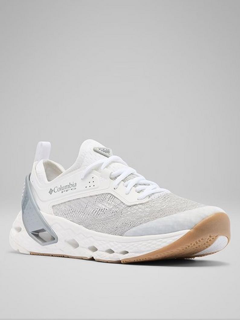 White athletic shoe with mesh upper, lace-up closure, cushioned midsole, and tan gum rubber outsole.