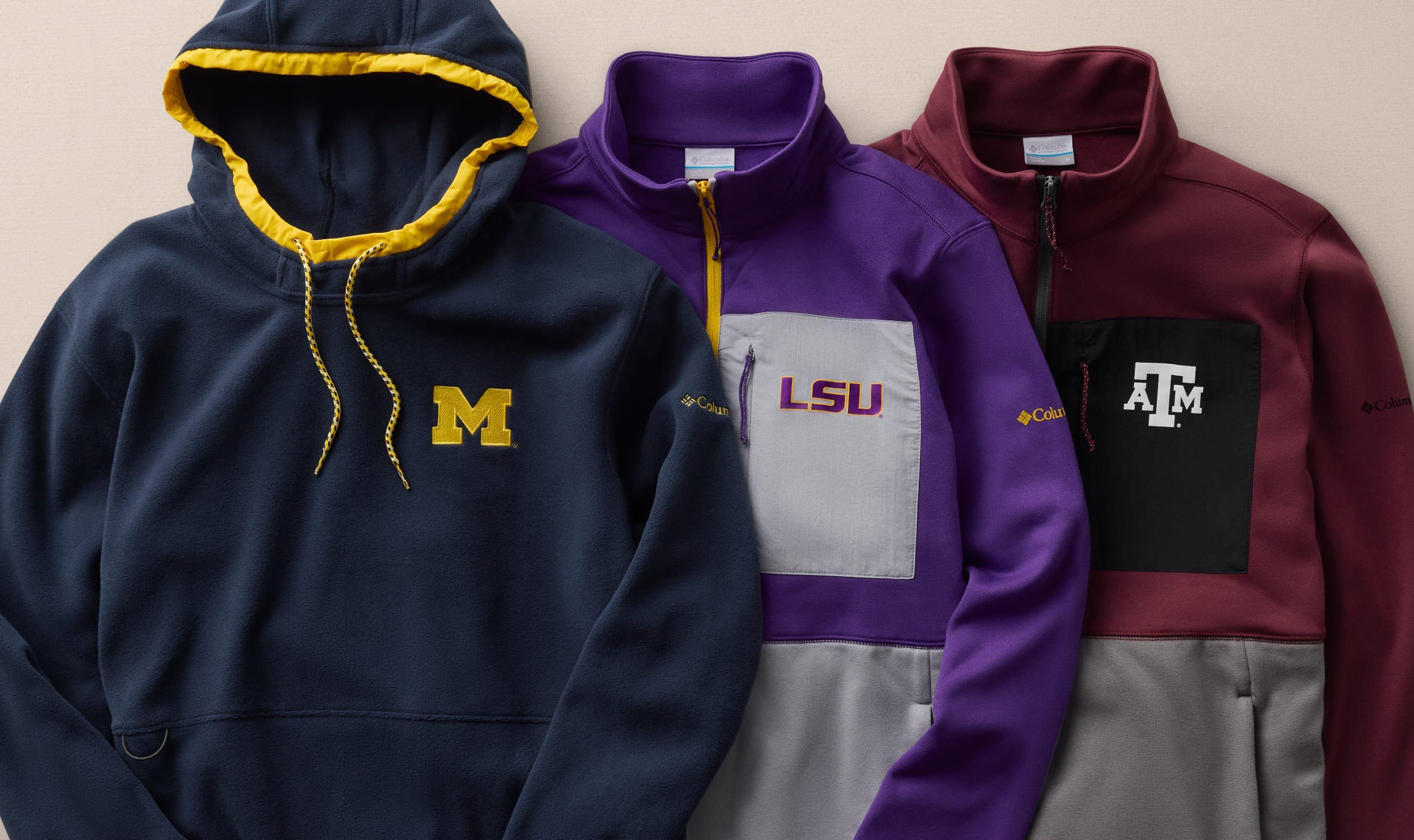 Three collegiate fleece pullovers featuring Michigan, LSU, and Texas A&M logos in navy, purple, and maroon colorways.