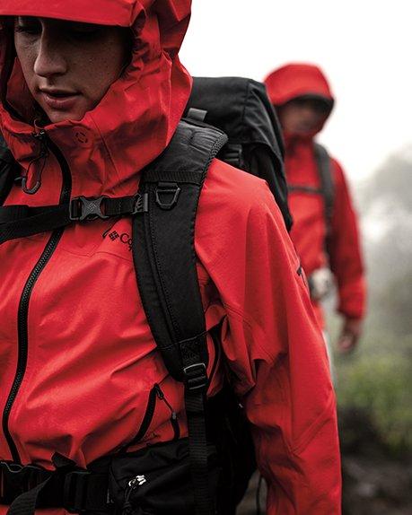 A man hiking in Columbia clothes and equipments
