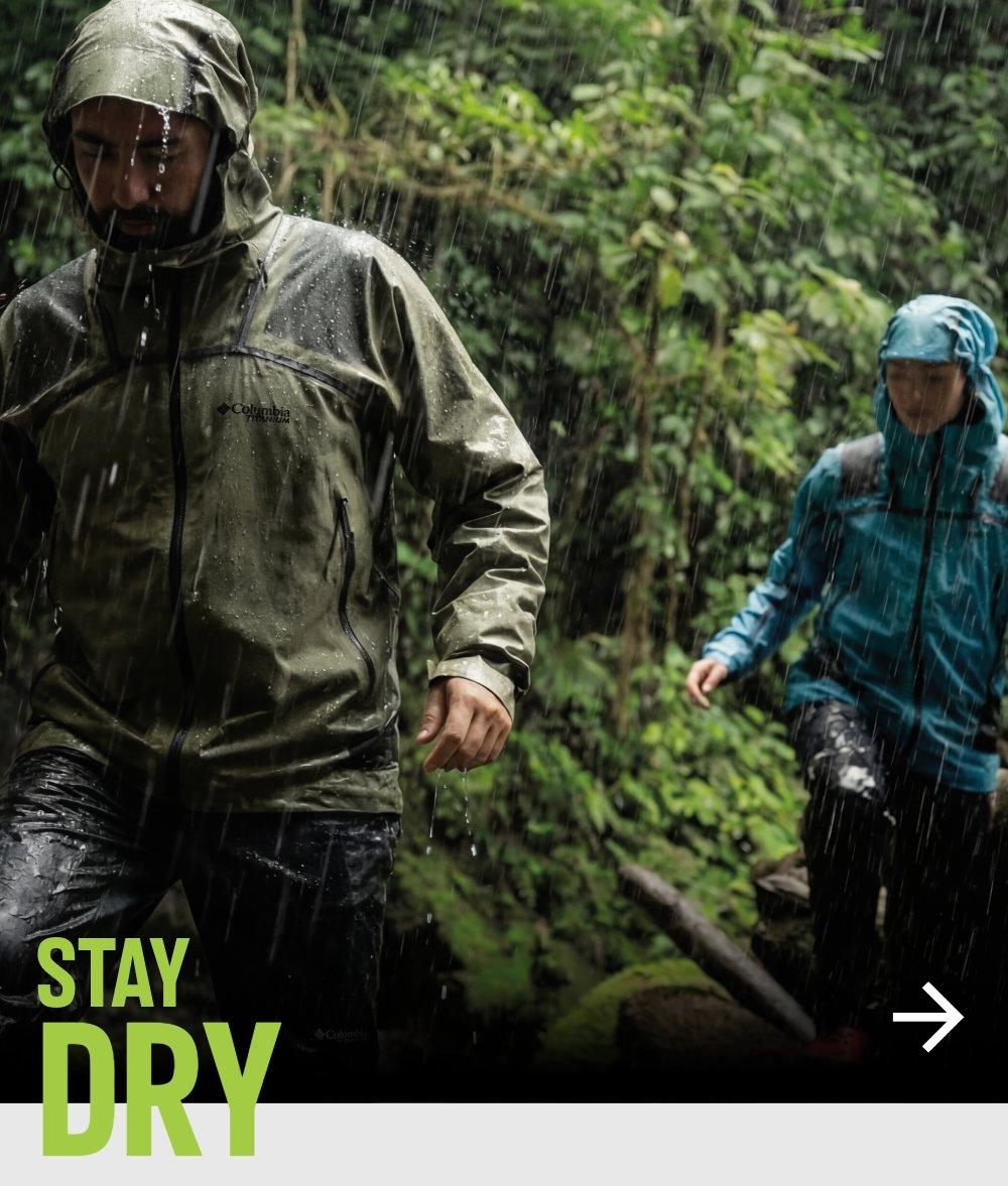 A man and a woman hiking in Columbia clothes and equipments