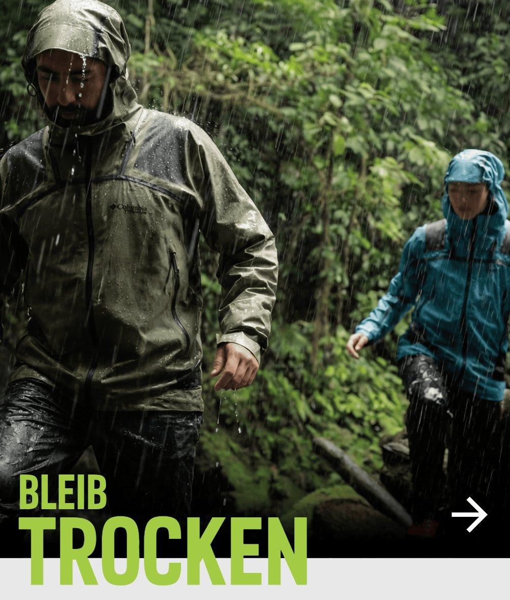 A man and a woman hiking in Columbia clothes and equipments