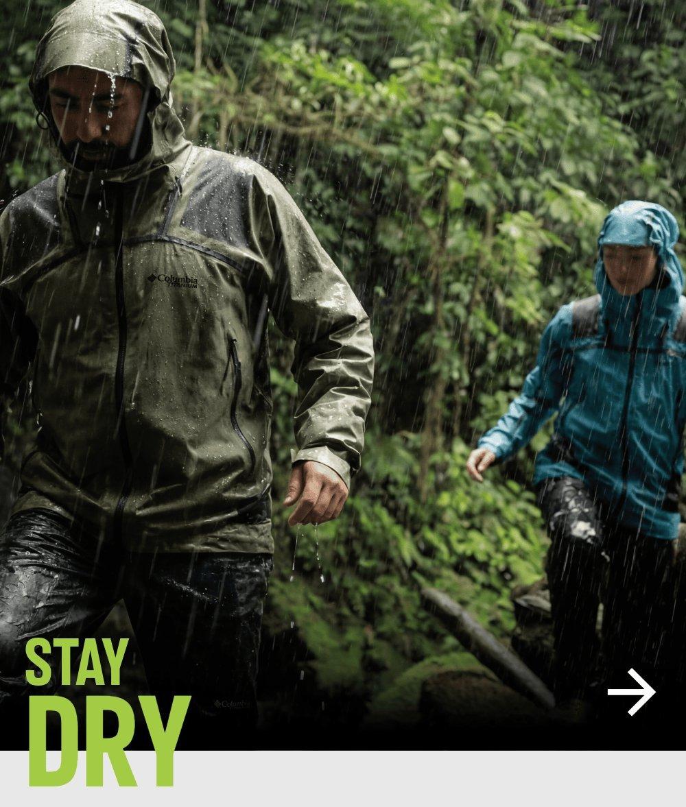 A man and a woman hiking in Columbia clothes and equipments