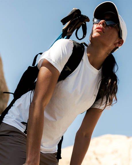 A man hiking in Columbia clothes and equipments