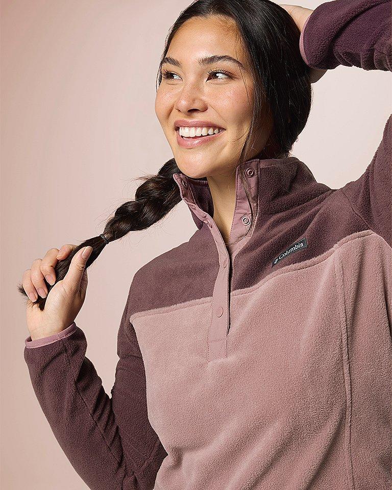 A woman wearing a warm and cozy fleece.