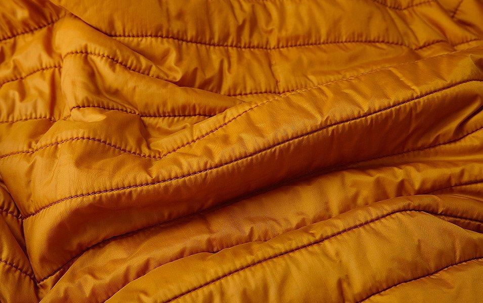  Up close up of a sleeping bag, perhaps on its way to the washing machine.