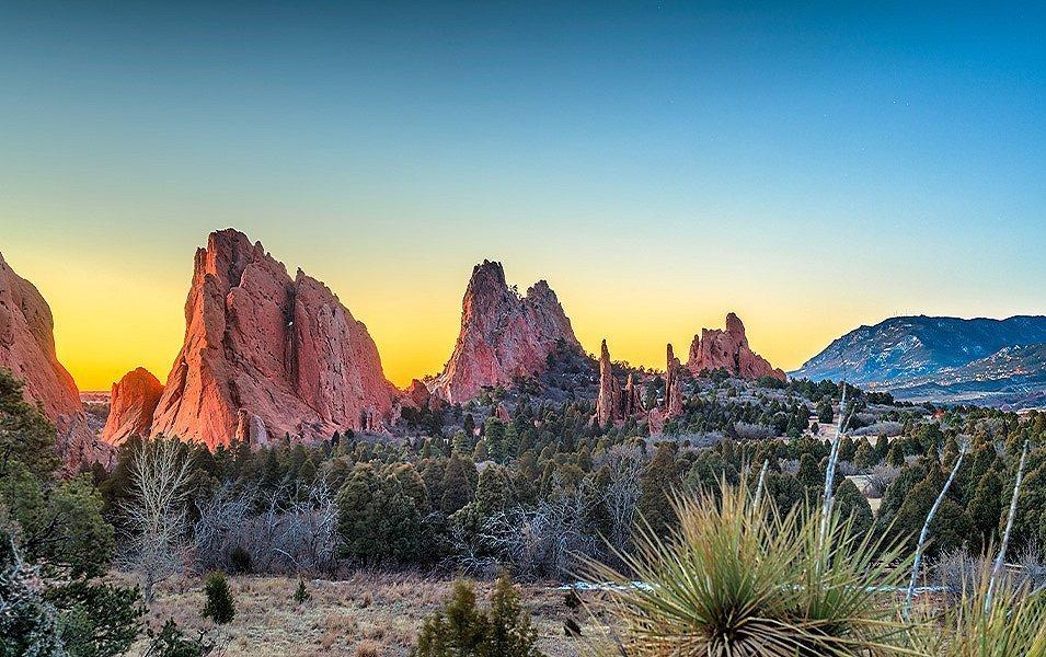 Castellated sandstone towers dominate the desert landscape.