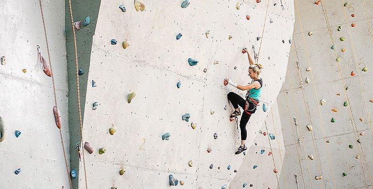 Learn more about indoor rock climbing gyms, the community that surrounds these gyms, and how to get started rock climbing.