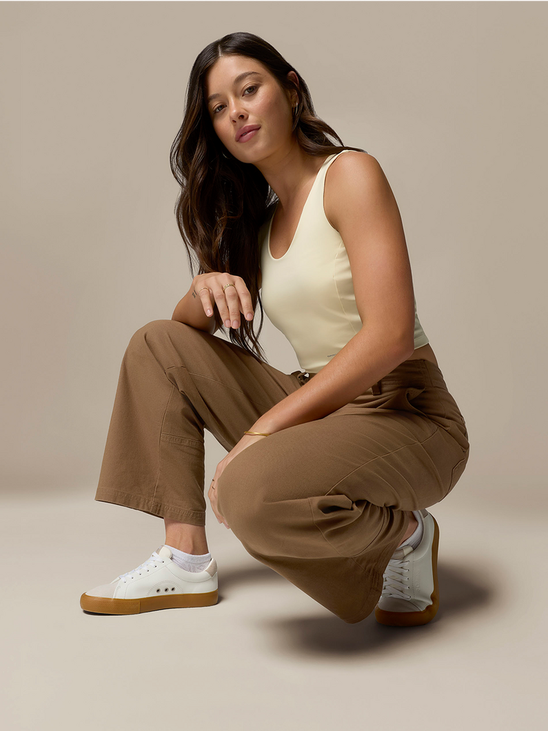 Women crouching in the ROC pant.