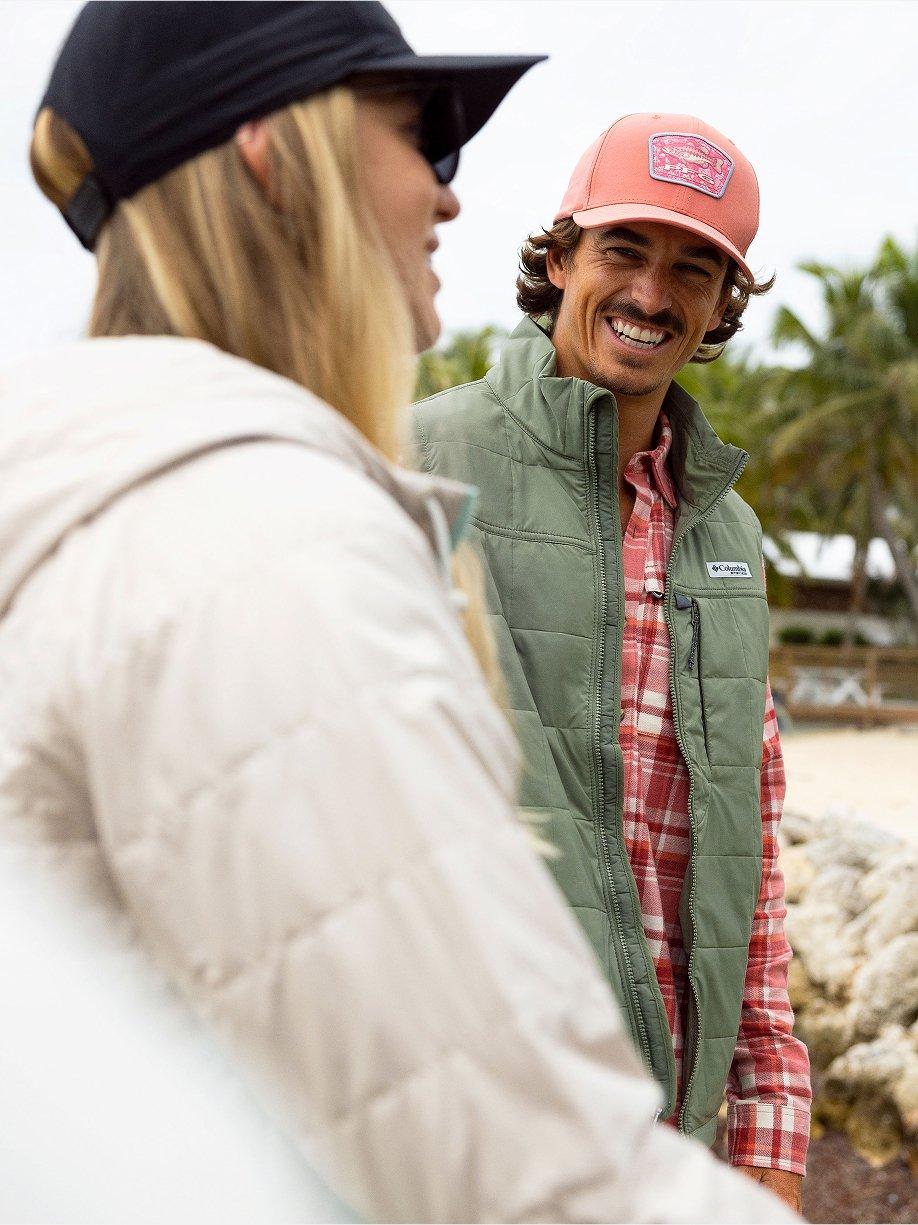 Fish With No Limits over an image of people by the water wearing PFG.