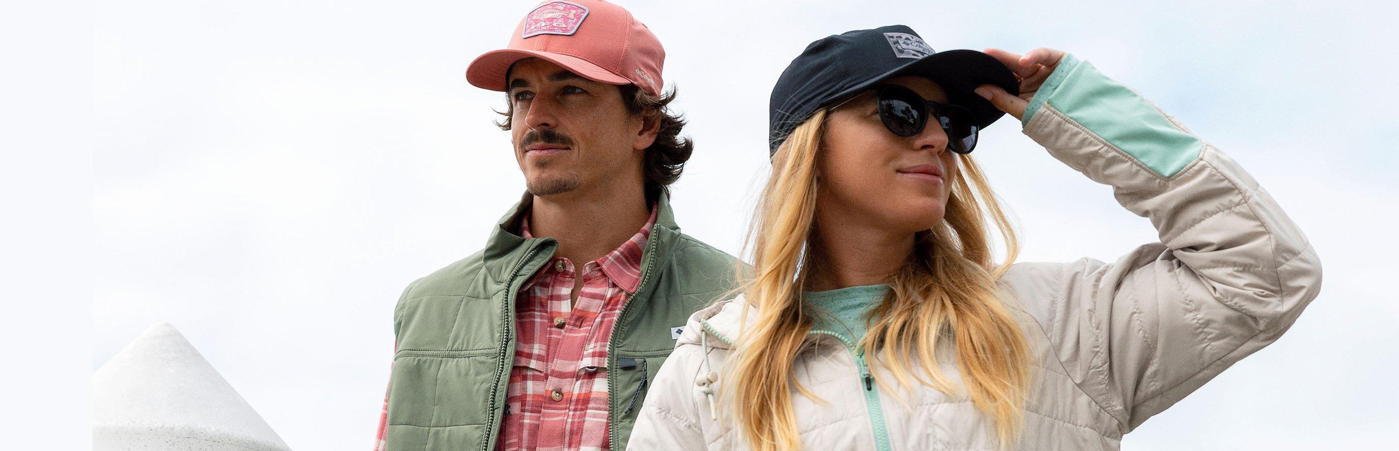 Man and woman on a dock with adventure angler collection apparel