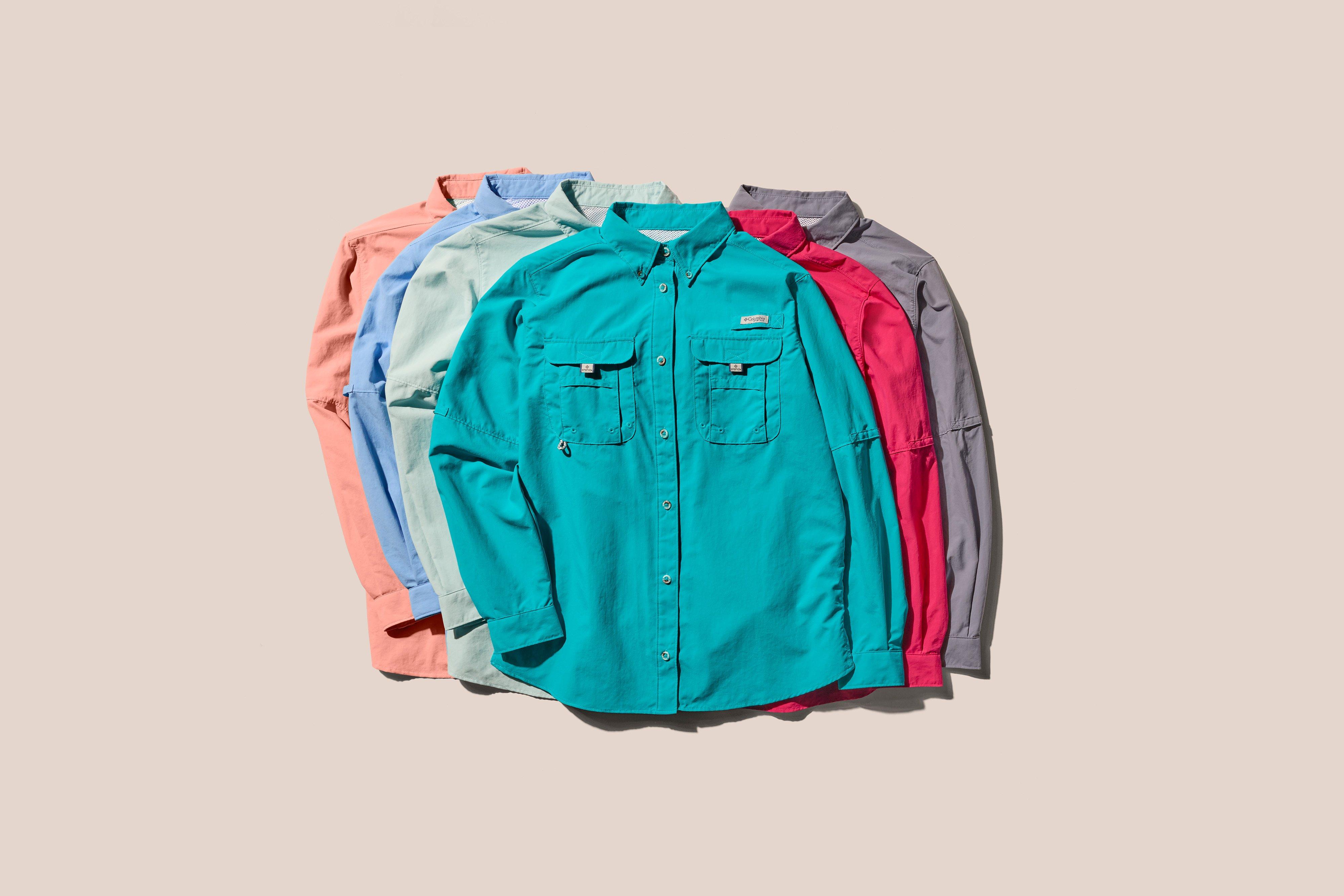 Stack of Bahama shirts in assorted colors.