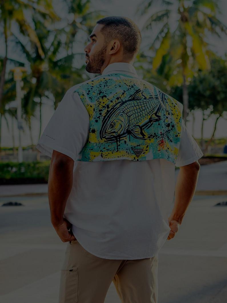 Man in a special edition Bahama shirt with graphic print by the artist Bentley.