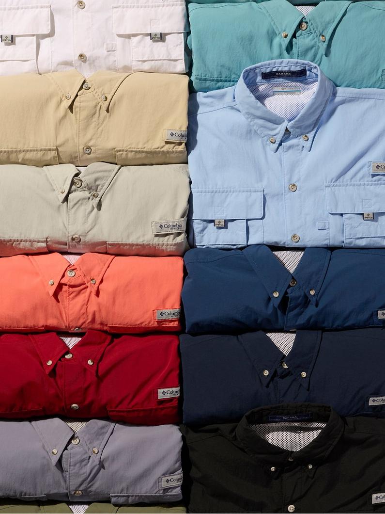 Stack of Bahama shirts in assorted colors.