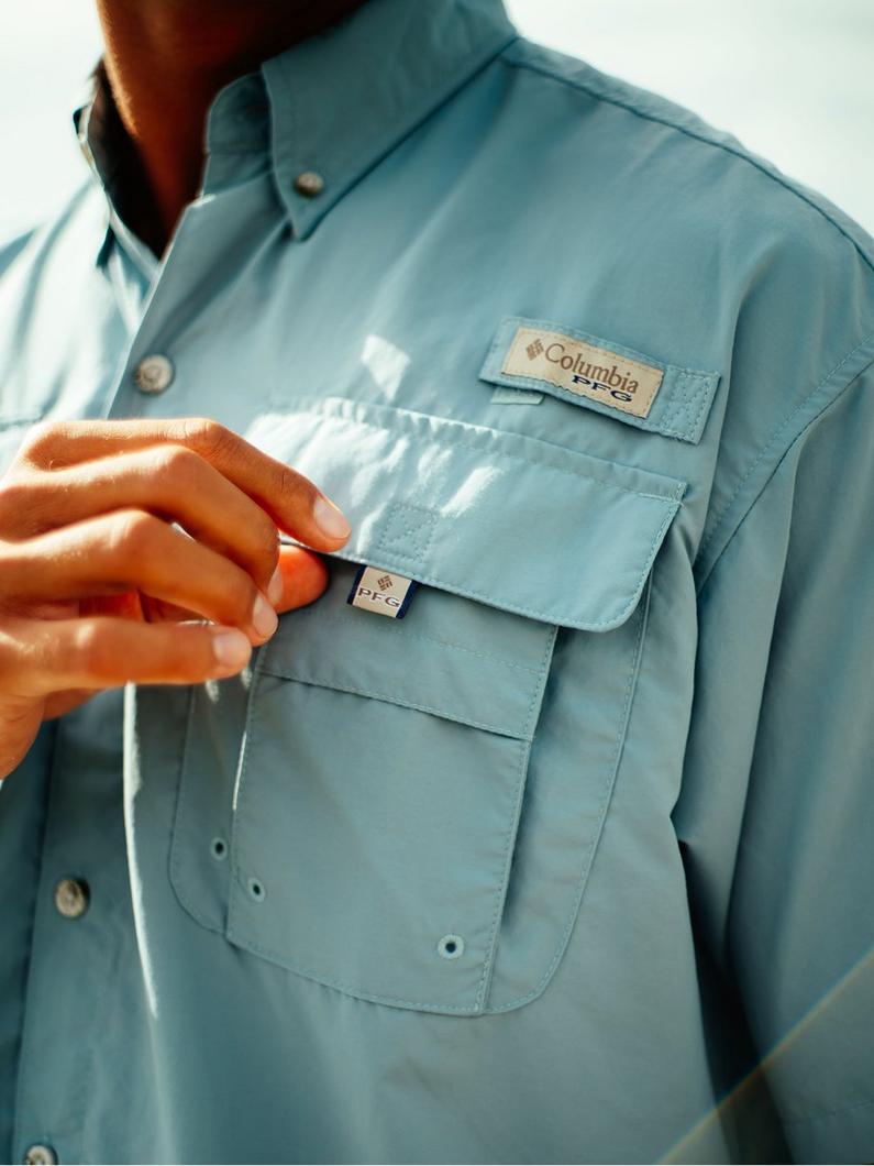 Close up of Bahama shirt chest pockets and rod holder.