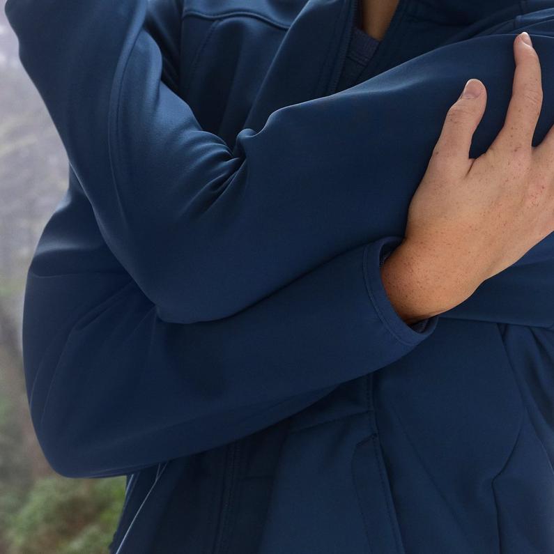 Model showing off the articulated elbows and stretchy material.