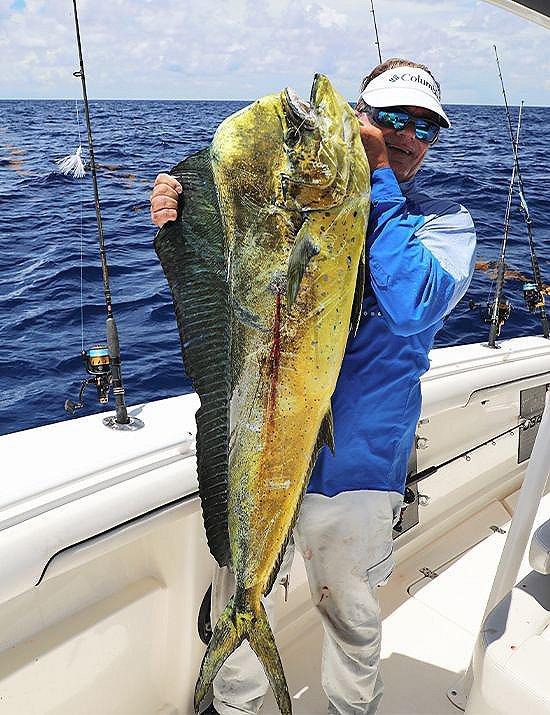 Close up of George Poveromo holding a trophy fish.