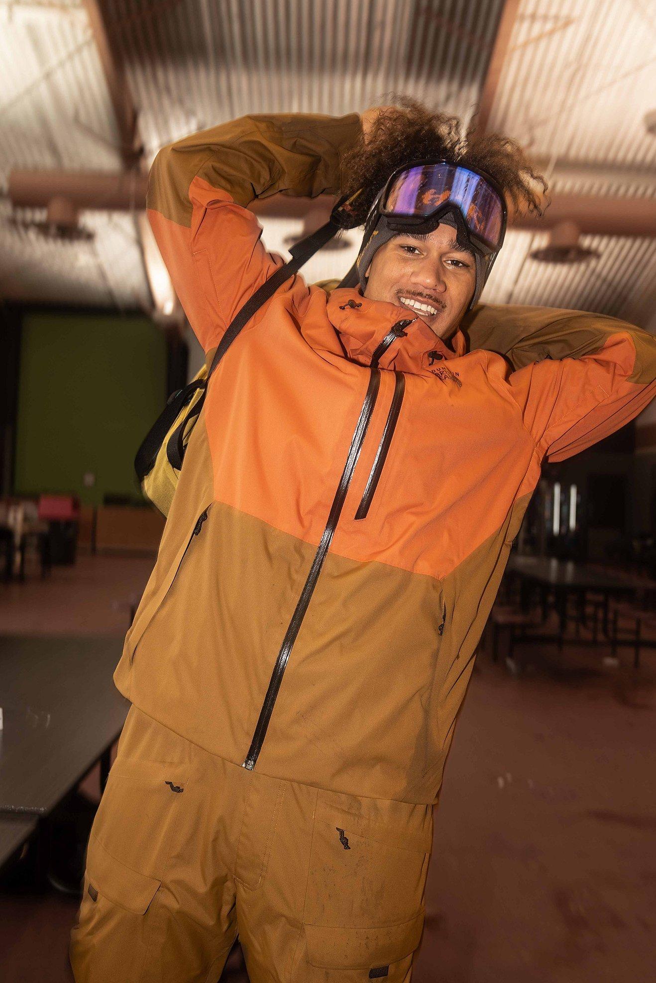 Bryce stretching and cheesin' in his snow gear
