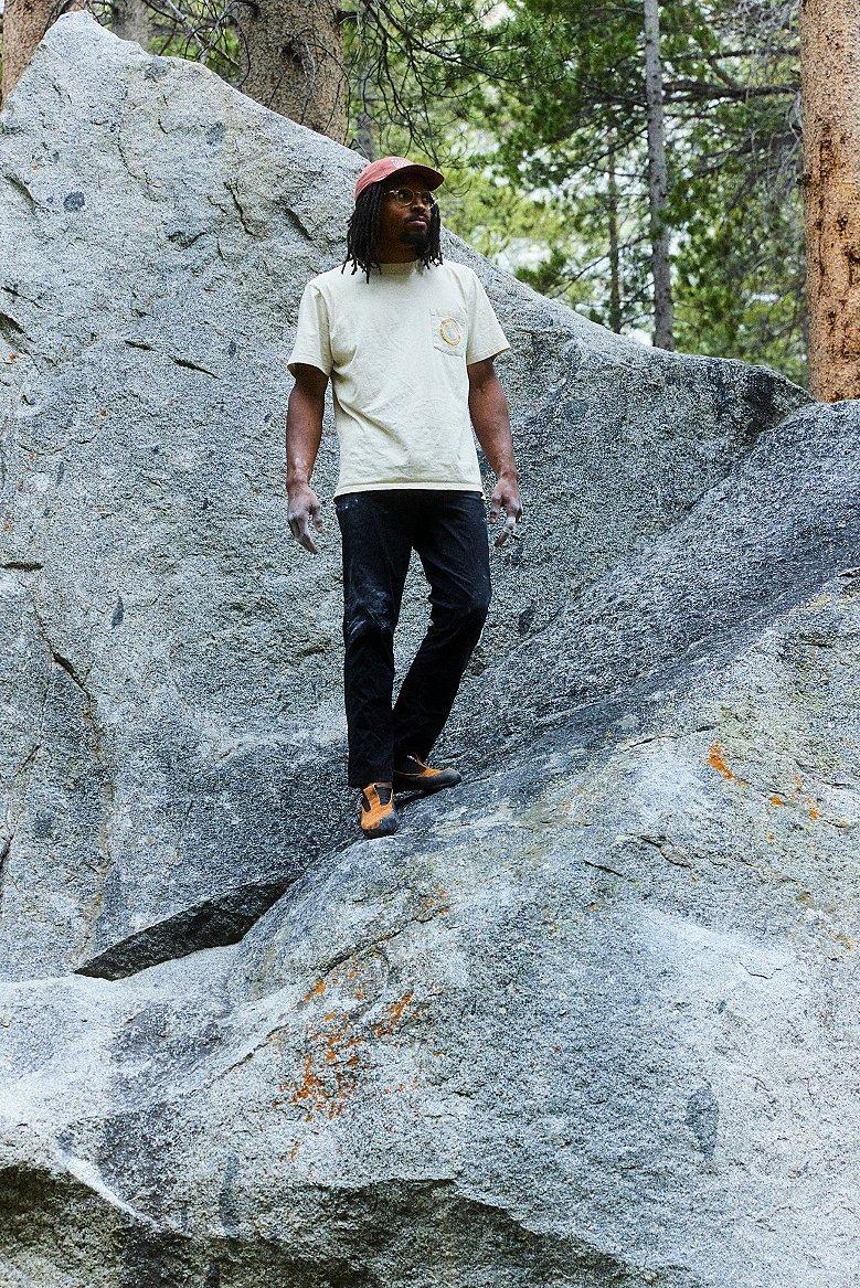 Caleb standing on rock