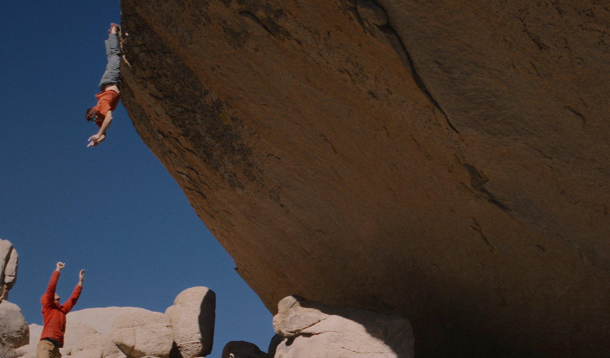 Ethan doing his signature move- a bat hang- in his film titled Sending.