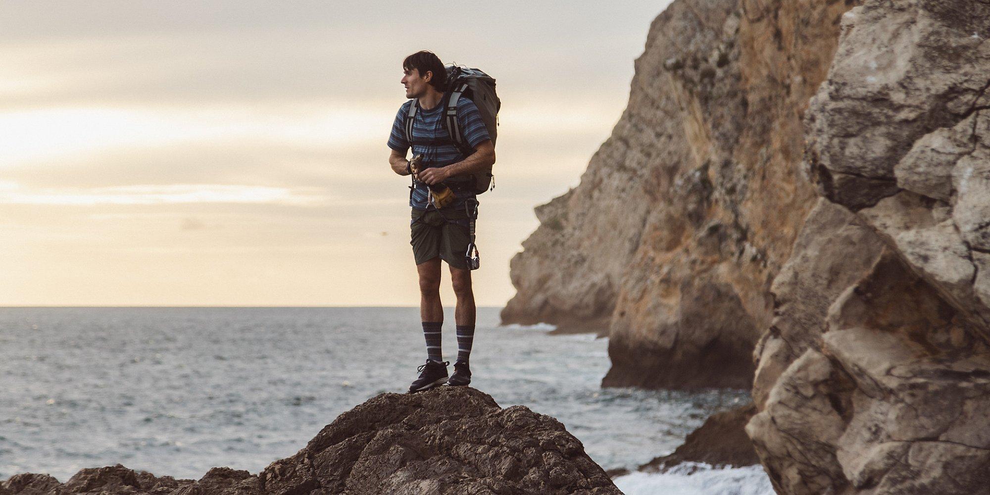 Ethan on a beach looking off into the distance