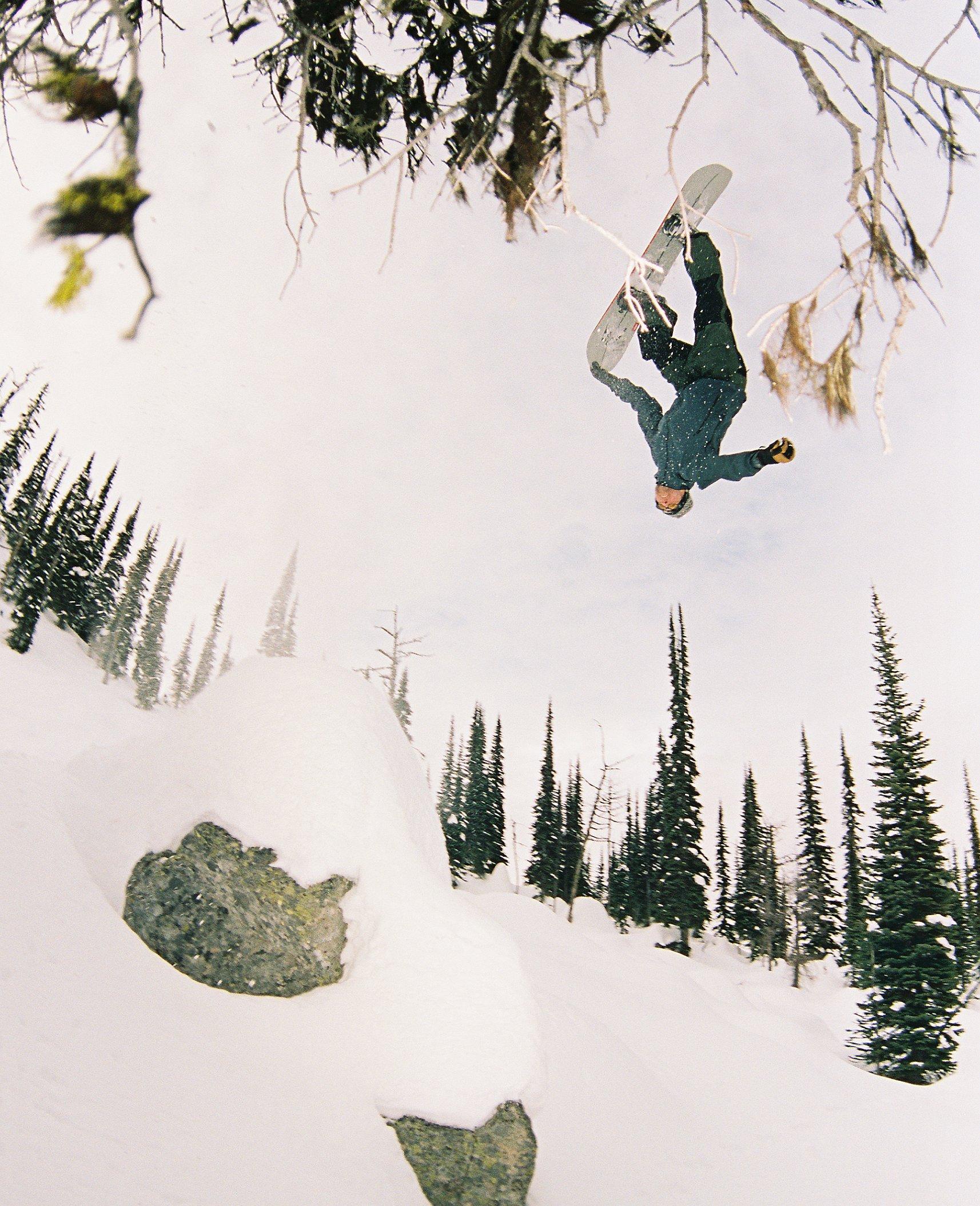 Jake in the middle of a flip on his board.