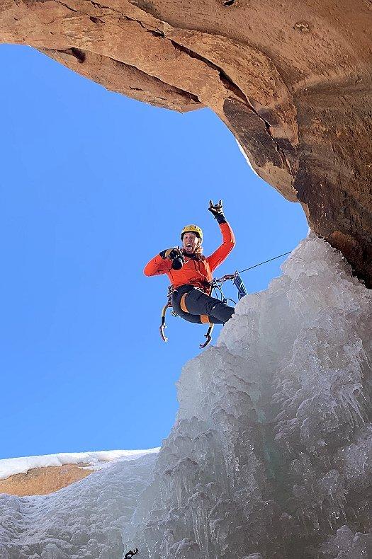 Photo war between Nikki and photographer while ice climbing