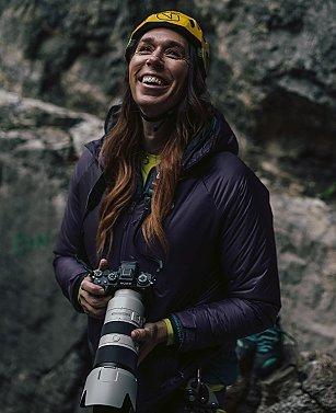 Nikki smiling with her camera