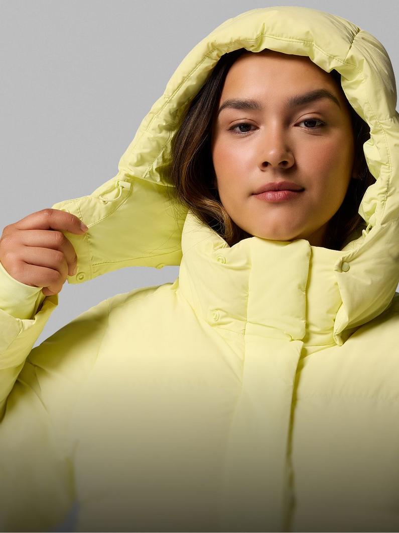 A woman wearing a puffer jacket