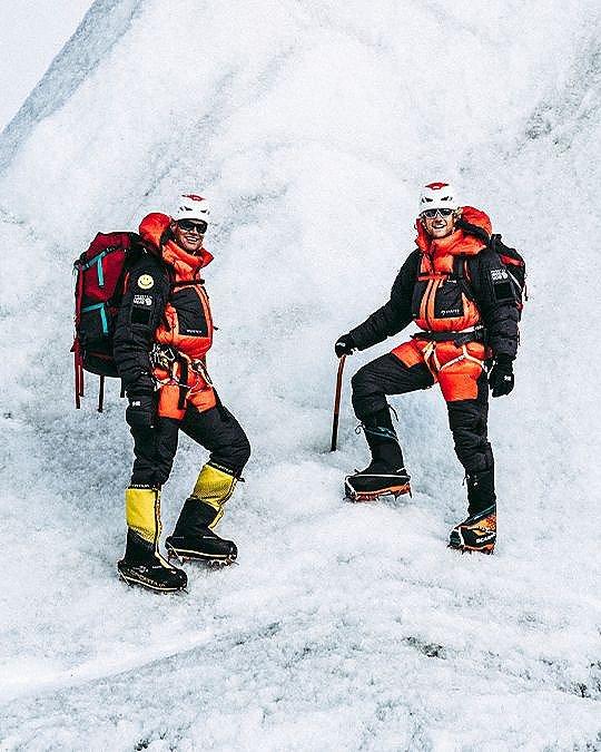 Mountain Hardwear athletes Garrett Madison and Tim Emmett, explore the glacier field near Everest Base Camp wearing the Absolute Zero Suit.