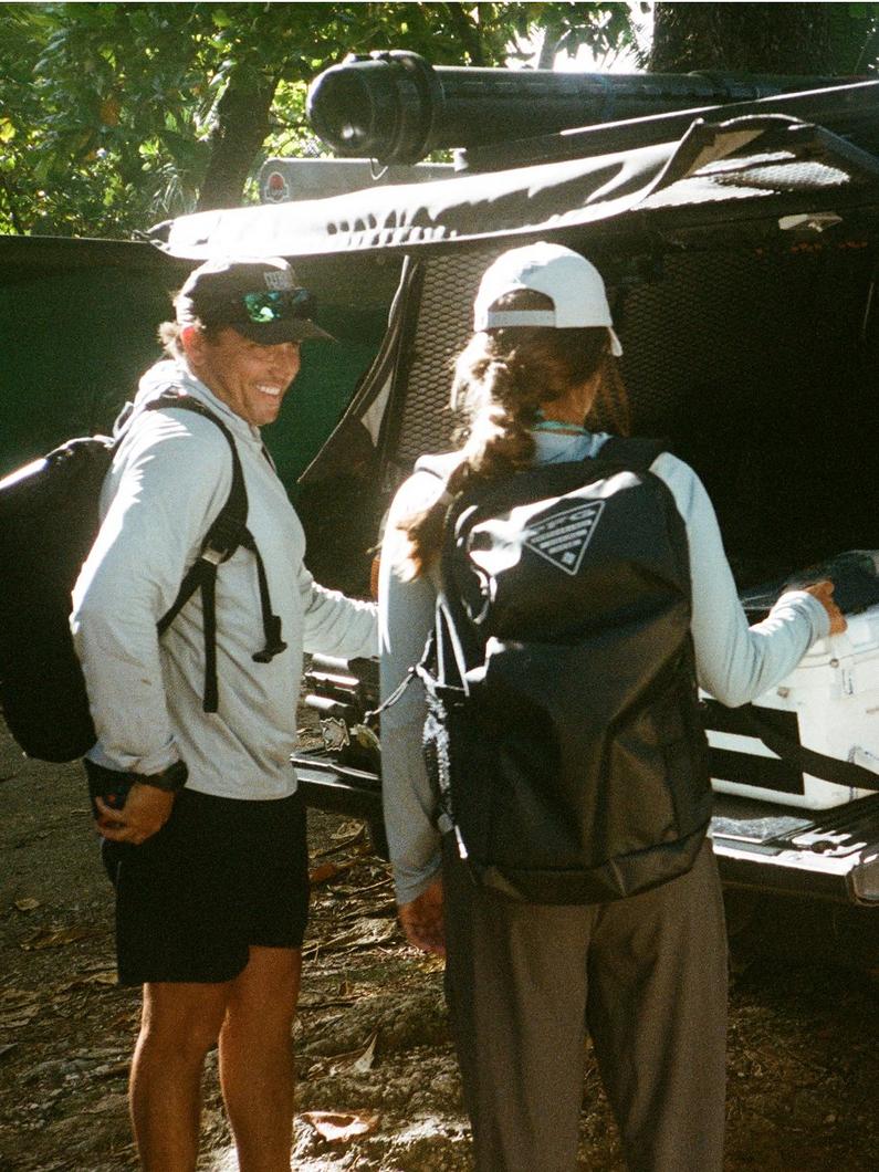 Anglers packing up a truck.
