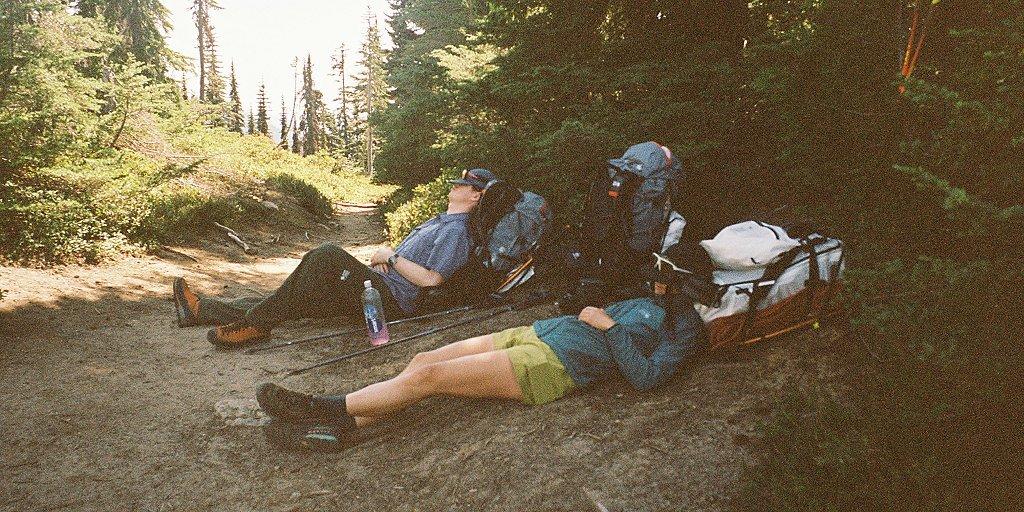 Resting in the Kor AirShell Warm off trail on a backpacking trip.