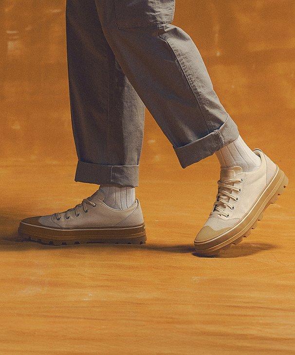 image of man wearing SOREL sneakers