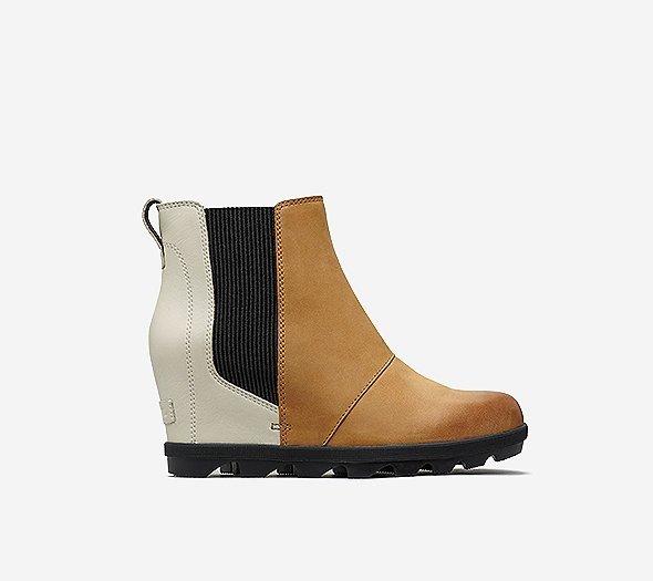 Profile view of a camel brown and white  Joan Wedge Chelsea boot