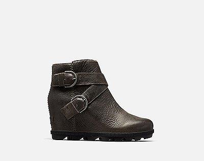  A Joan Wedge Buckle boot on a white background 