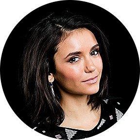 A portrait image of Nina Dobrev