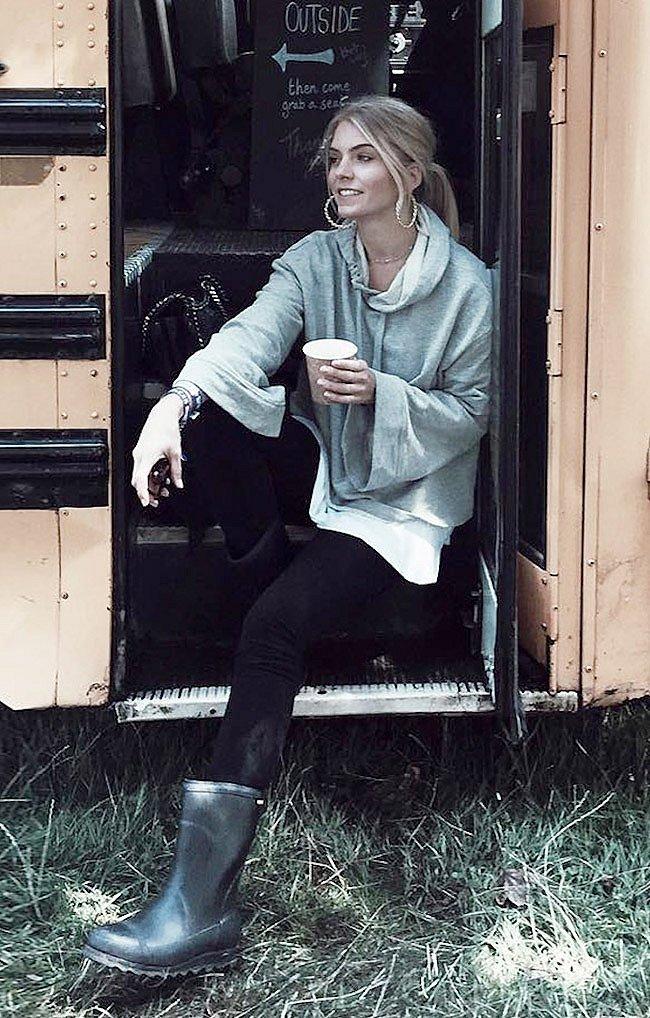 A woman wearing the JOAN™ RAIN SHORT GLOSS shoe