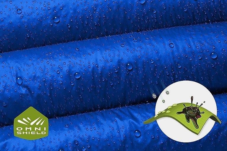 Close up of the pant's tan fabric with the Omni Wick logo in the bottom left and a graphic showing how moisture rises to the fabric's surface to evaporate in the bottom right.
