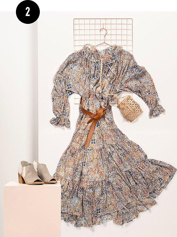 A floral dress outfit styled by Kate with SOREL Nadia ankle booties