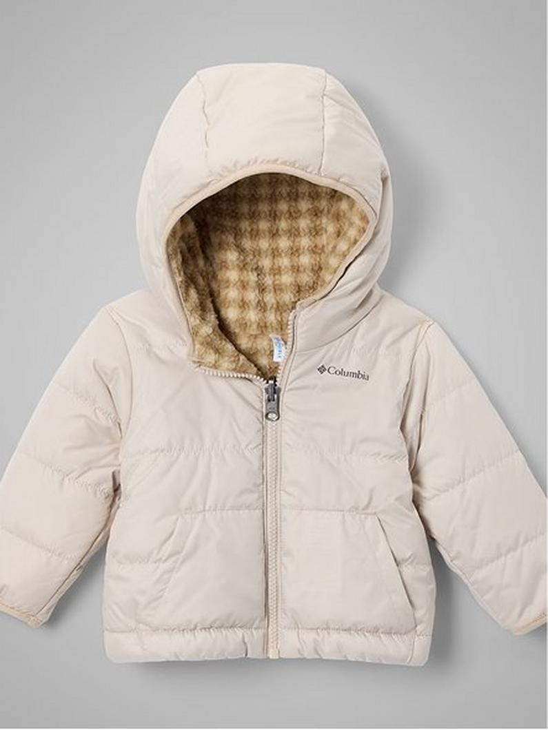 Cream puffer jacket with hood unzipped to show plaid fleece lining and front pockets.