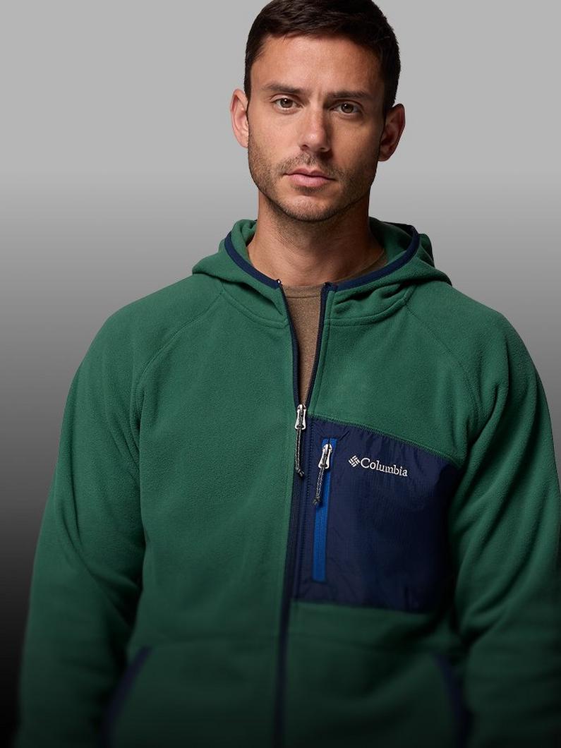 A man wearing a green fleece