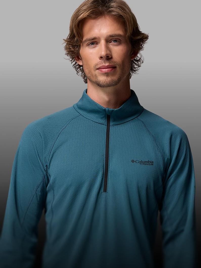 A man wearing a blue pullover