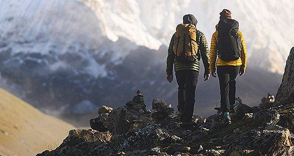 Two trekkers getting close to Everest Base Camp, taking in the view