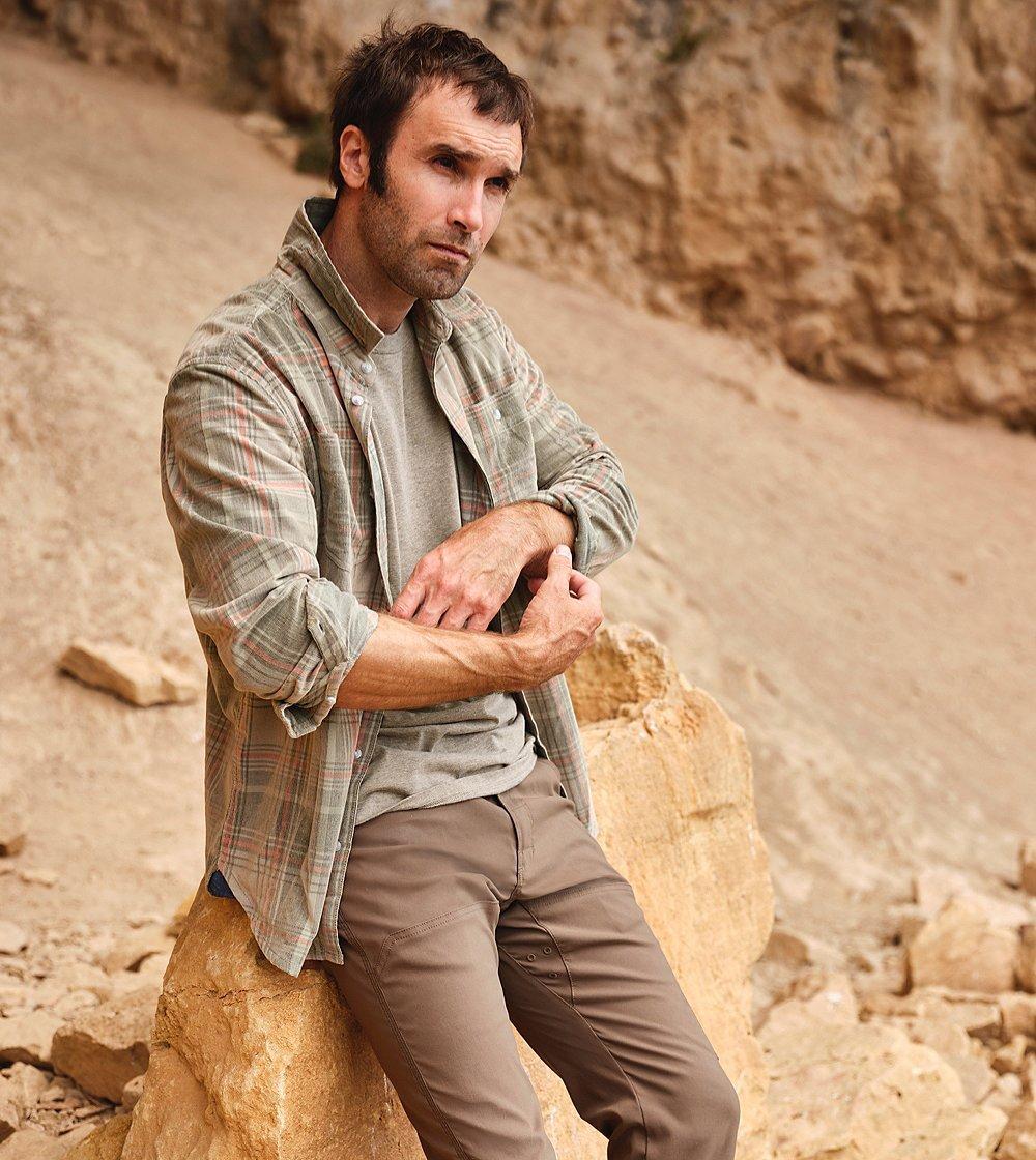Chris Sharma wearing jeans and flannel represents prAna's denim collection.