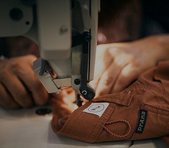 A close-up image of a prAna product being refurbished represents Circularity